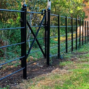 Strong estate fencing with 5 rails and bespoke gate hand made to client's specifications